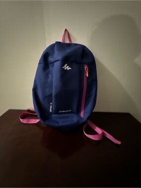 Quechua Blue Backpack with Pink Accents